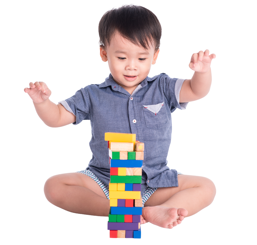 young child playing with construction blocks